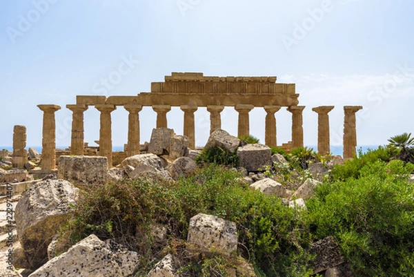 Fototapeta Ruins of the Temple C dedicated to Apollo, inside the archaeological park of Selinunte, an ancient Greek city on a seaside hill in the south west coast of Sicily.