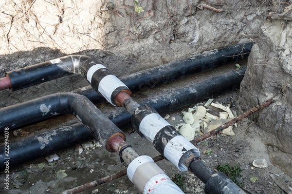 Obraz Pipes in the Earthen Trench  for Heating System