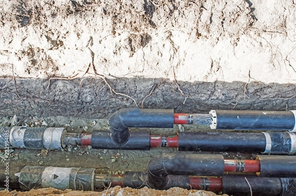 Obraz Pipes in the Earthen Trench  for Heating System