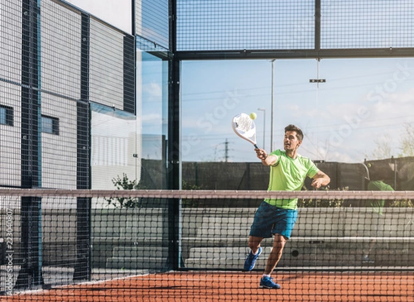 Fototapeta Man playing padel