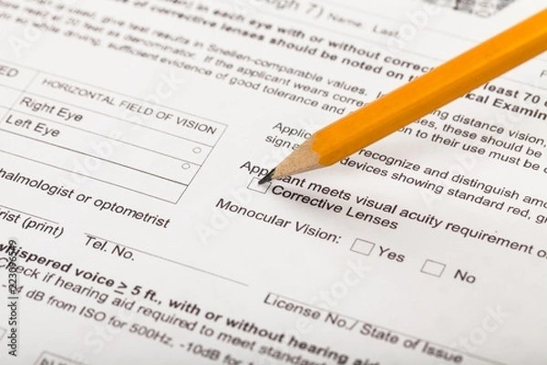 Obraz Filling out Answers with Pencil on the Test