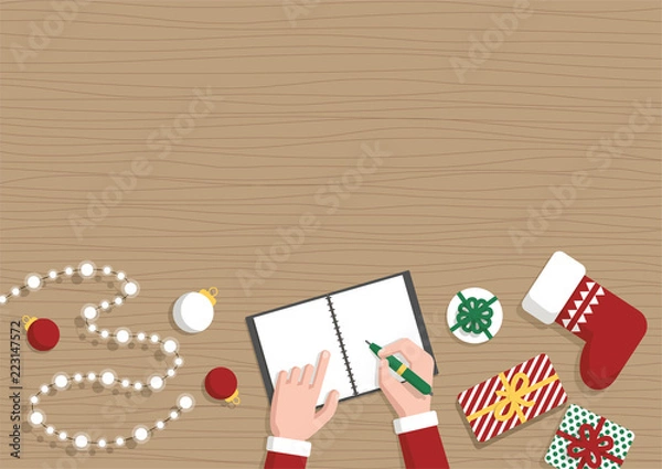 Fototapeta Conceptual horizontal Christmas flat banner. Santa Claus workshop, top view. Santa's hands make up a list of gifts in notebook, gifts, Christmas toys and garland on table, vector