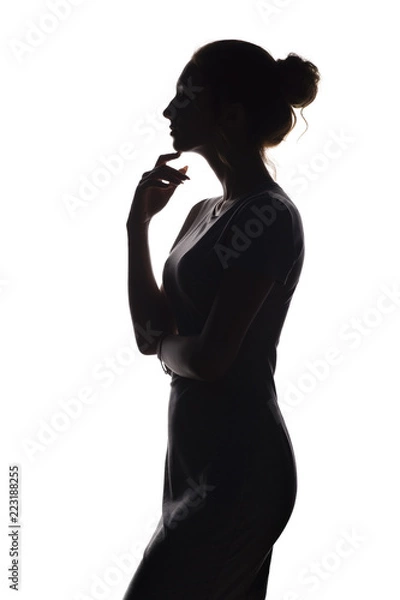 Obraz profile of beautiful girl with hand-picked hair, silhouette of a woman on a white isolated background