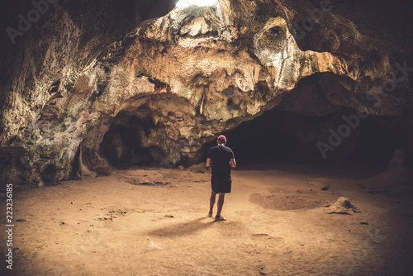 Fototapeta Man lost in a cave