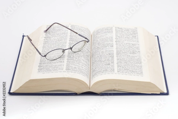 Fototapeta dictionary & glasses