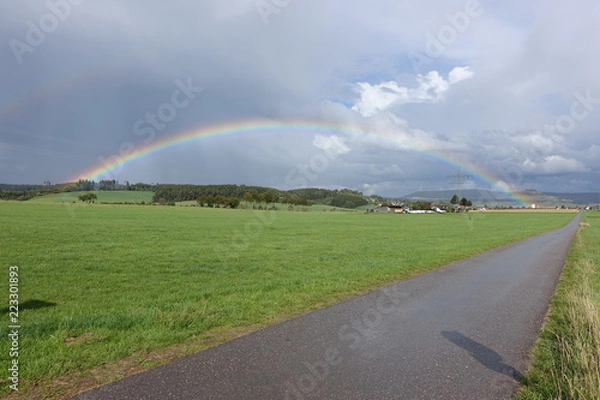 Obraz Regenbogen über dem Land