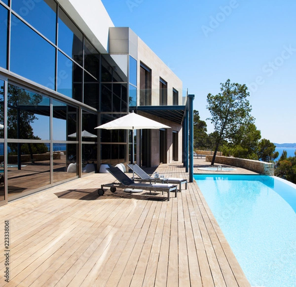 Obraz Luxury villa with swimming pool. Modern villa with pool.