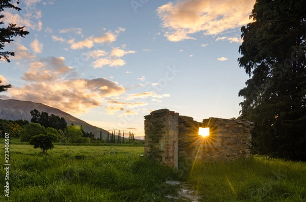 Fototapeta sunset througha window, frame 