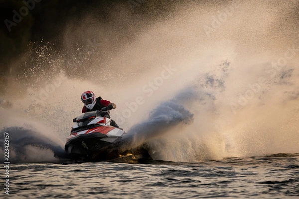 Fototapeta Dynamic action on a water scooter