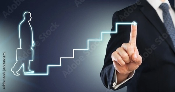 Fototapeta Businessman drawing graphics on background