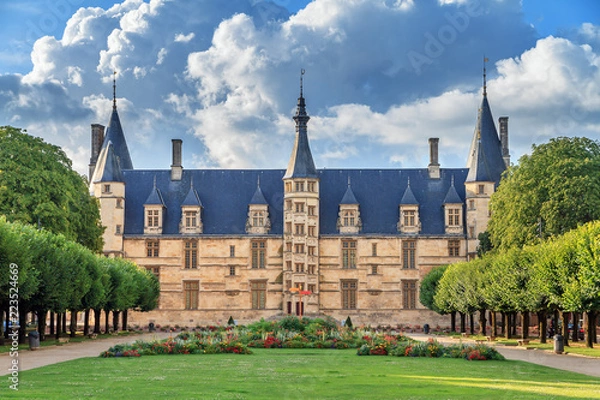 Obraz The 15th century historical monument Ducal Palace of Nevers (Palais ducal de Nevers) is the first of the river Loire‘s castles with its renaissance façade surrounded by the polygon turrets