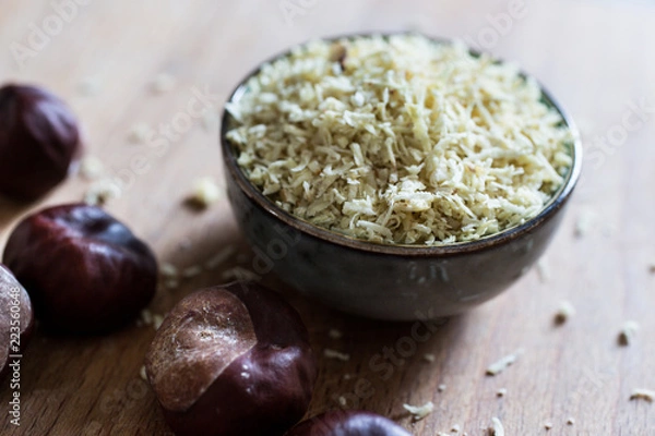 Obraz macro still of natural biological washing powder made of chestnuts