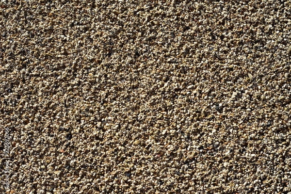 Fototapeta Pattern of fine gravel particles bonded together by resin.