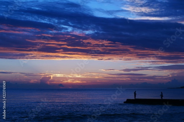 Obraz sunset and fisherman