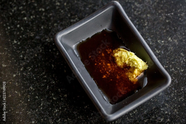 Fototapeta Close up wasabi cream and soy sauce. sauce for japanese food, sushi, sashimi and teppanyaki.