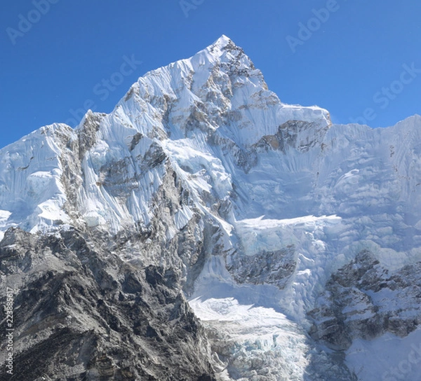 Fototapeta Amazing and wonderful Shot of Nepalese Himalayas mountain peaks covered with white snow attract many climbers, some of them highly experienced 
