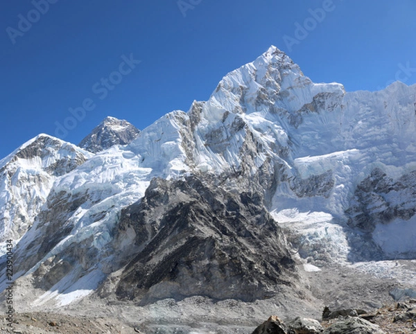 Fototapeta Amazing and wonderful Shot of Nepalese Himalayas mountain peaks covered with white snow attract many climbers, some of them highly experienced 