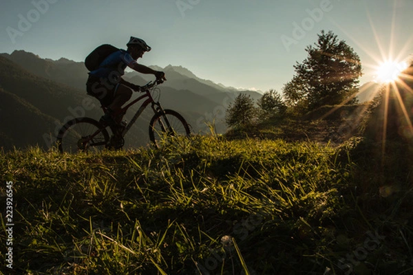 Fototapeta Mountain Biker at Sunset