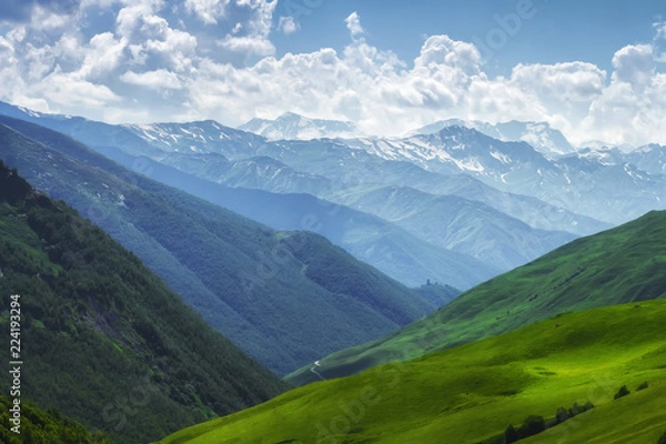 Fototapeta Mountains nature landscape on sunny summer day. Mountains ranges in Svaneti, Georgia. Scenery Hills and mountain. Amazing mountain range. Alpine. Green meadow covered by grass in highlands