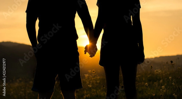 Obraz Silhouette of a couple holding hands