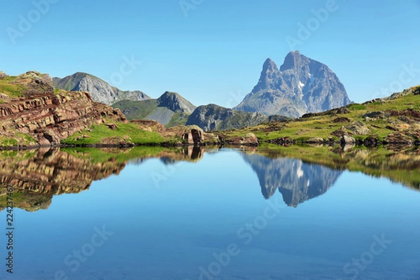 Fototapeta Pic du Midi d Ossau reflecting in Anayet lake, Spanish Pyrenees, Aragon, Spain
