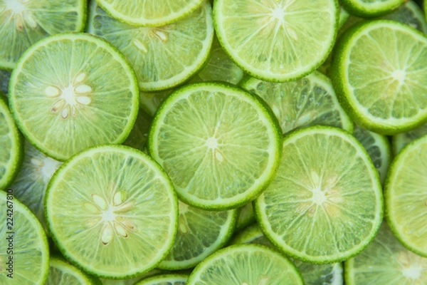 Obraz Citrus fruit of lime slices background