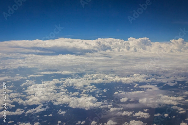 Fototapeta Blue sky with clouds background on the airplan