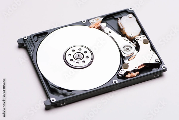 Obraz A hard disk drive isolated on white background.