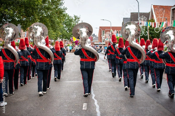 Fototapeta Details from a show and Marchingband or fanfare and drumband with uniforms and Instruments.