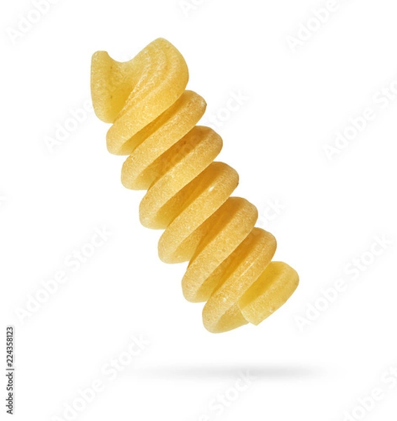 Fototapeta Fusilli pasta isolated with clipping path