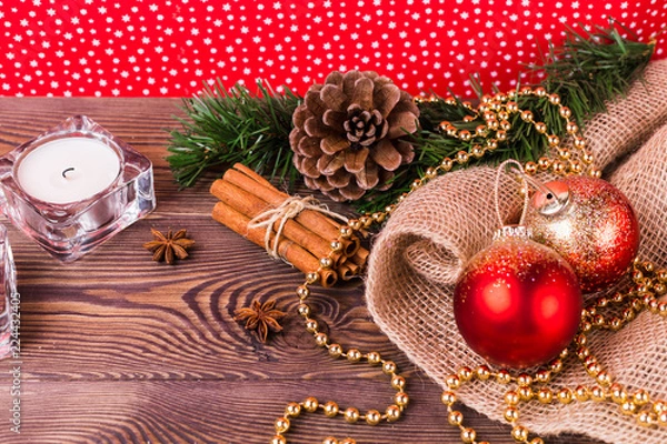 Fototapeta Christmas and New Year holiday background. Christmas decor on a wooden table. Top view, blank space