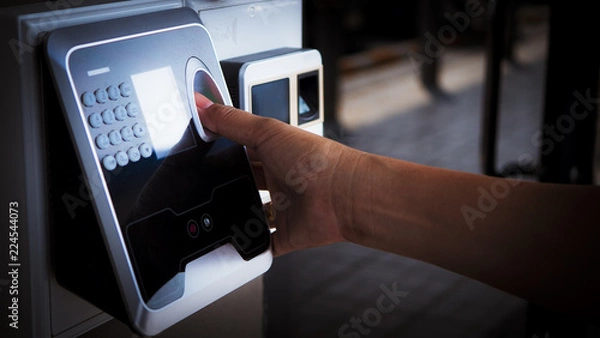 Obraz Finger print scan for enter security system with copyspace.