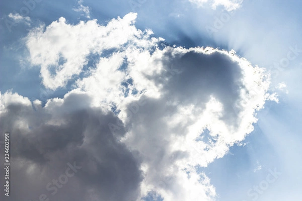 Obraz Sun on blue sky with clouds 