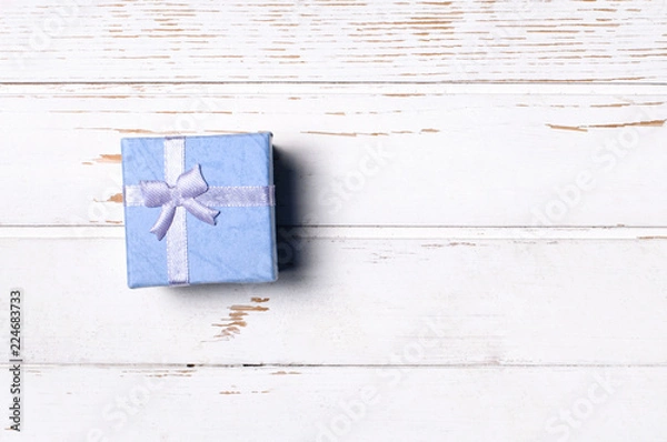 Obraz Gift box on wooden background.