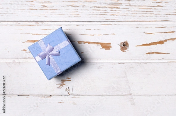 Obraz Gift box on wooden background.