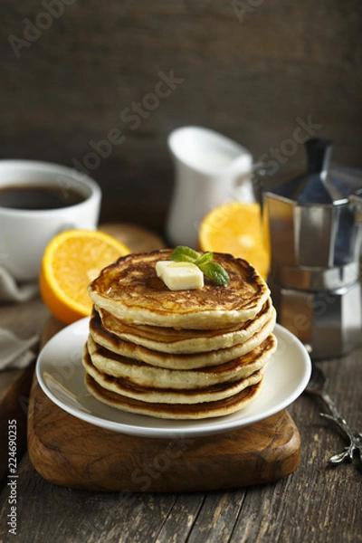 Fototapeta Homemade pancakes with honey and butter