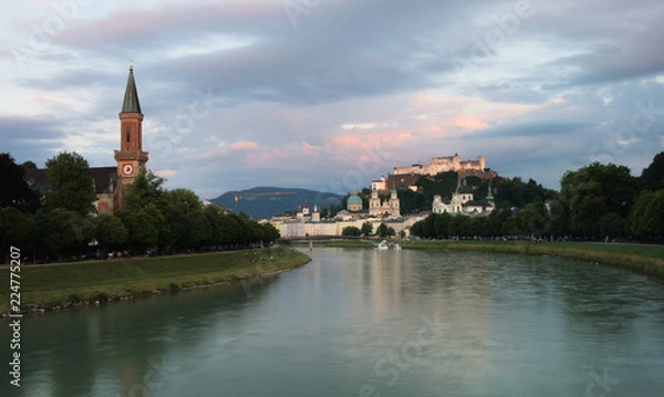 Fototapeta River Salzach with Christ church (Christuskirche) on the left and Hohensalzburg Fortress on the right. Salzburg, Austria. 
