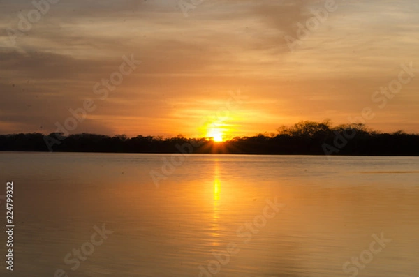 Fototapeta sunset over lake