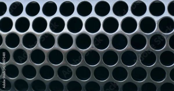 Fototapeta grating in a hole made of metal texture
