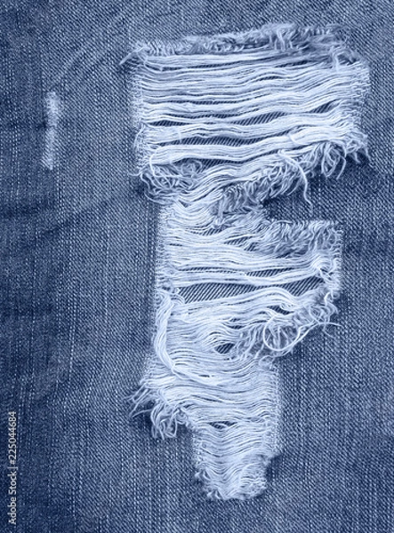 Fototapeta Jeans background. texture torn denim