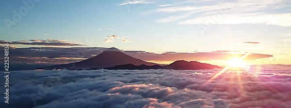 Fototapeta 富士山を取り巻く雲海と朝日
