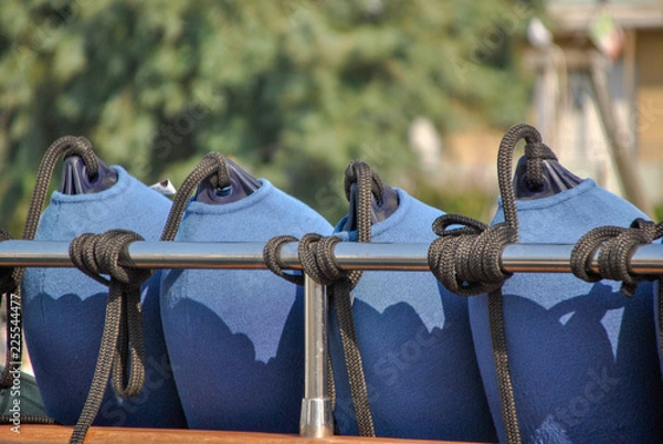 Obraz modern blue and black bumpers of a yatch