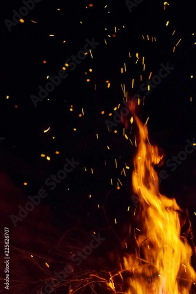 Obraz Night bonfire with sparks. Fire background with copyspace
