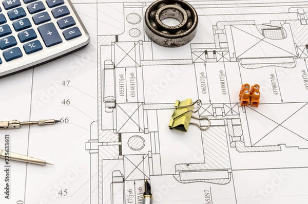 Obraz Engineer project and different tools on it, closeup