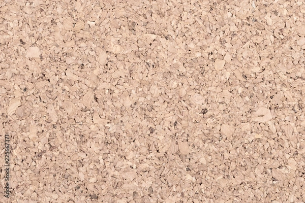 Fototapeta Cork board background texture - insert your own message or bulletin with thumbtacks.