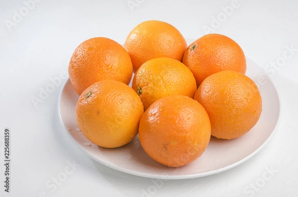Obraz Orange on a white plate