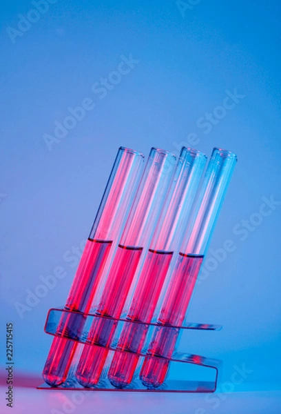 Obraz Test tubes i pink and blue light