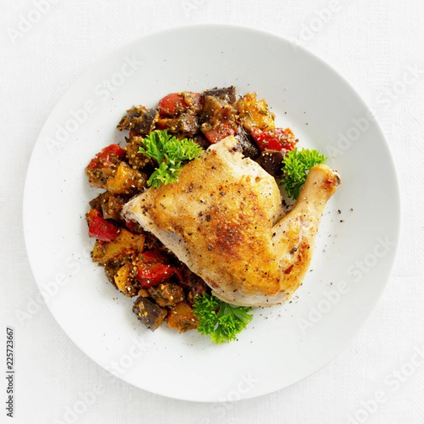 Fototapeta ajapsandali and chicken tabaka leg decotared with parsley 