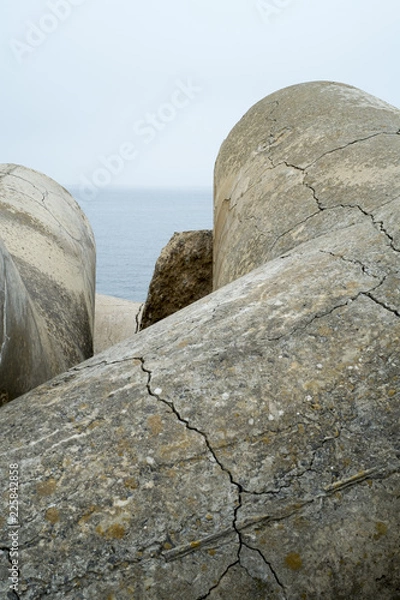 Fototapeta sea bar with protections in stone