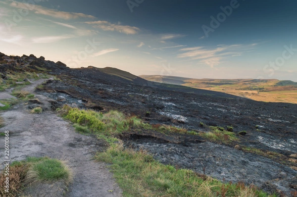 Fototapeta The scorched landscape of The Roaches, Staffordshire after a wildfire in the Peak District National Park
